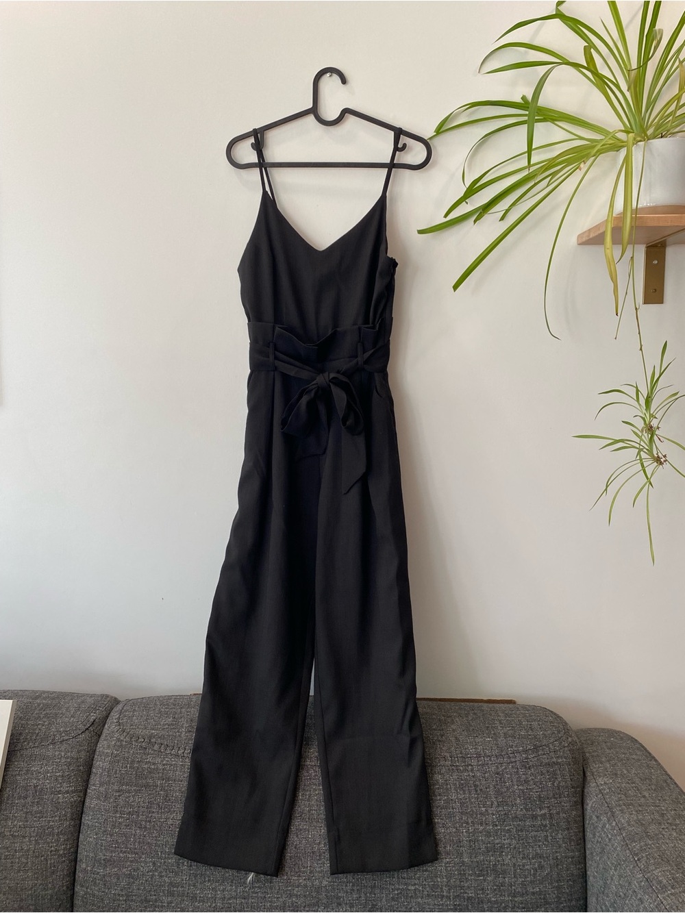 L'ATISTE Black Sleeveless V-Neck Jumpsuit with Waist Tie